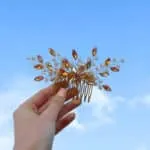 Broche cheveux dorée fleur , modelé Peigne en cristal 