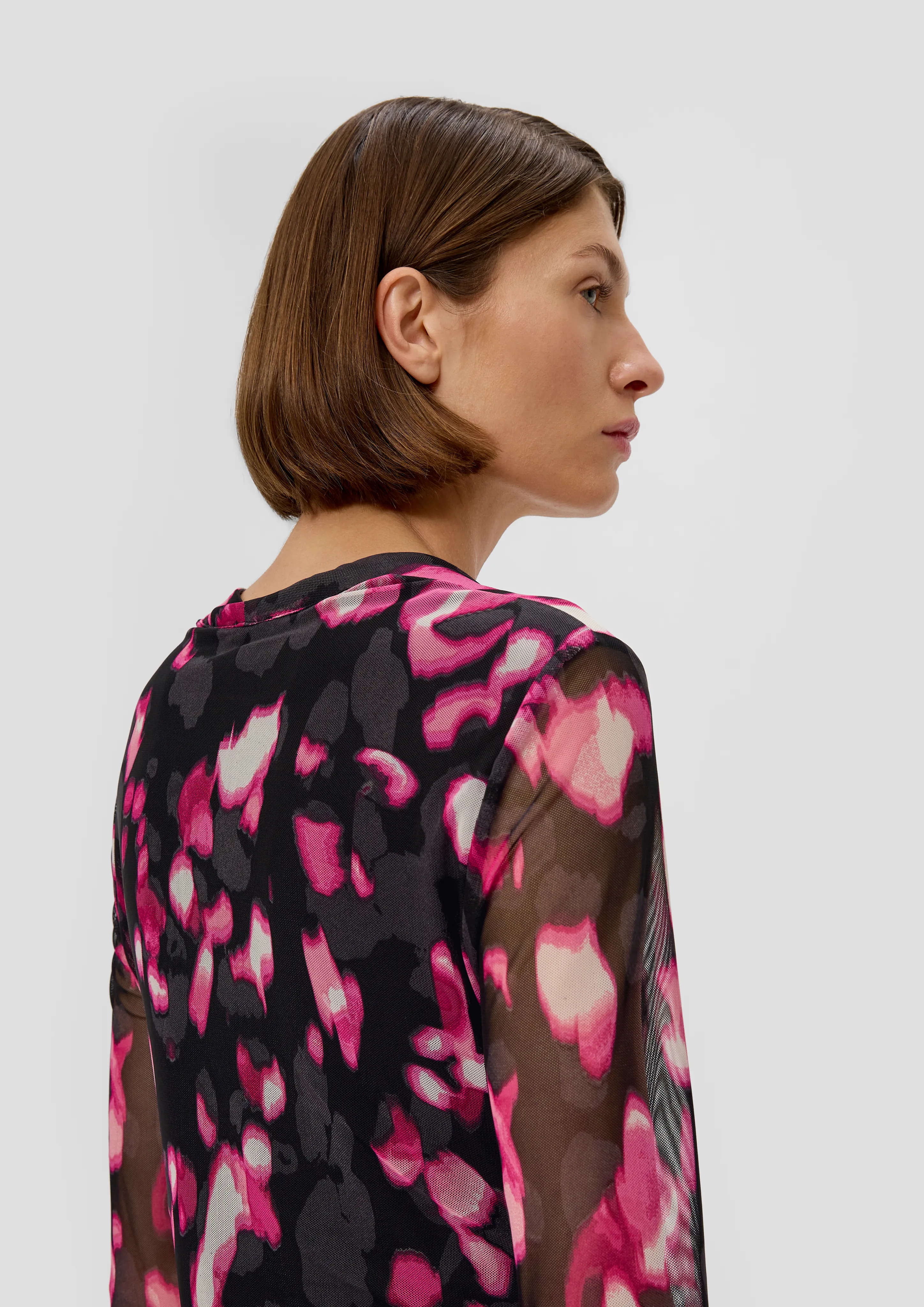 Robe en maille ornée de fronces